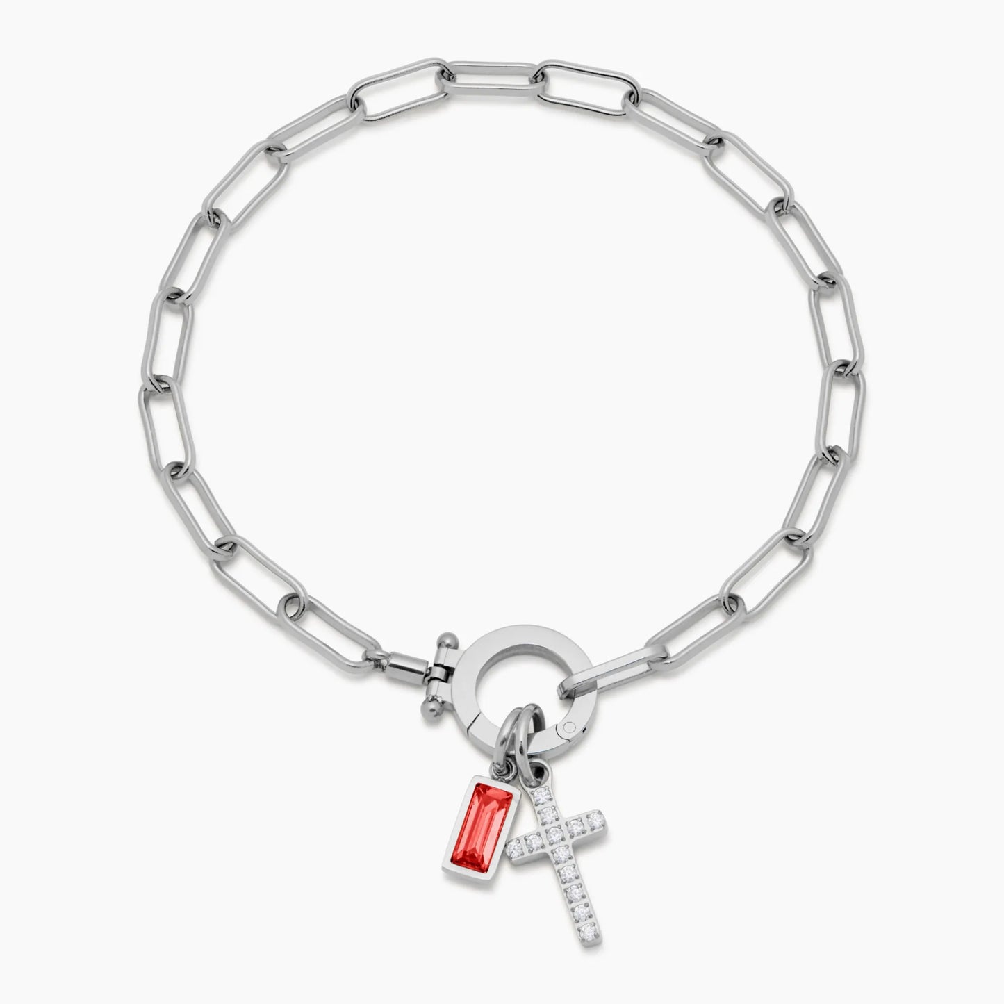 Silver paperclip cross charm bracelet on wrist — Olivia Jewelry