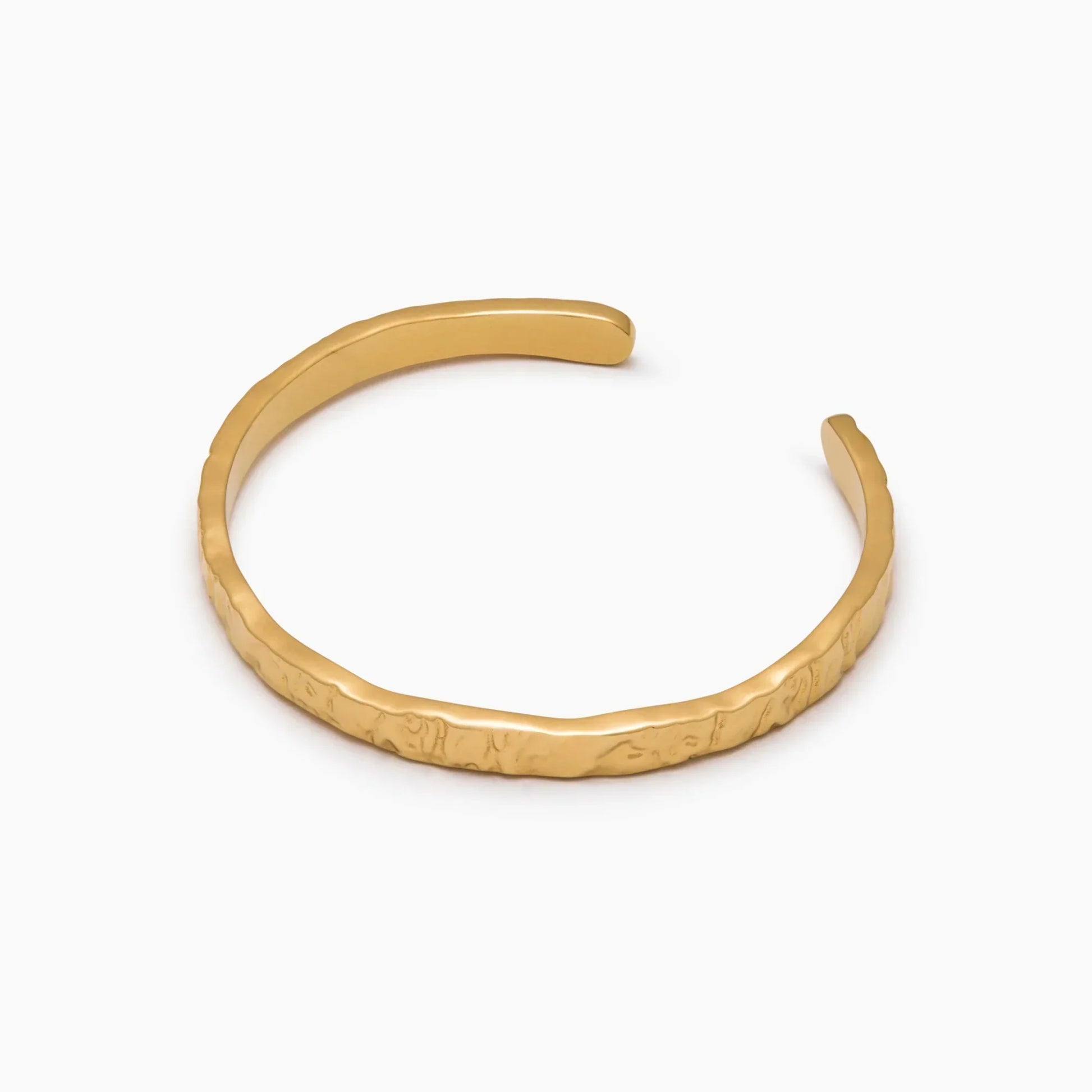 Textured cuff bracelet flat lay — Olivia Jewelry