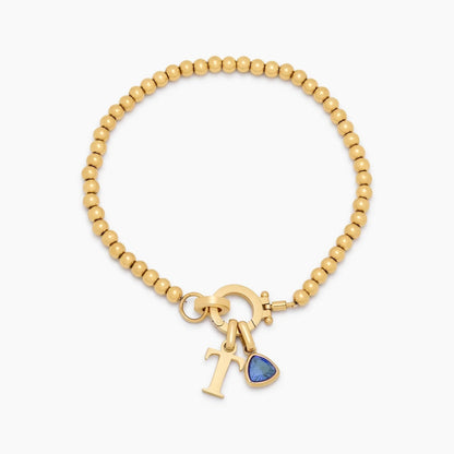 beaded-birthstone-initial-charm-bracelet — Gold / Dec-Blue Topaz