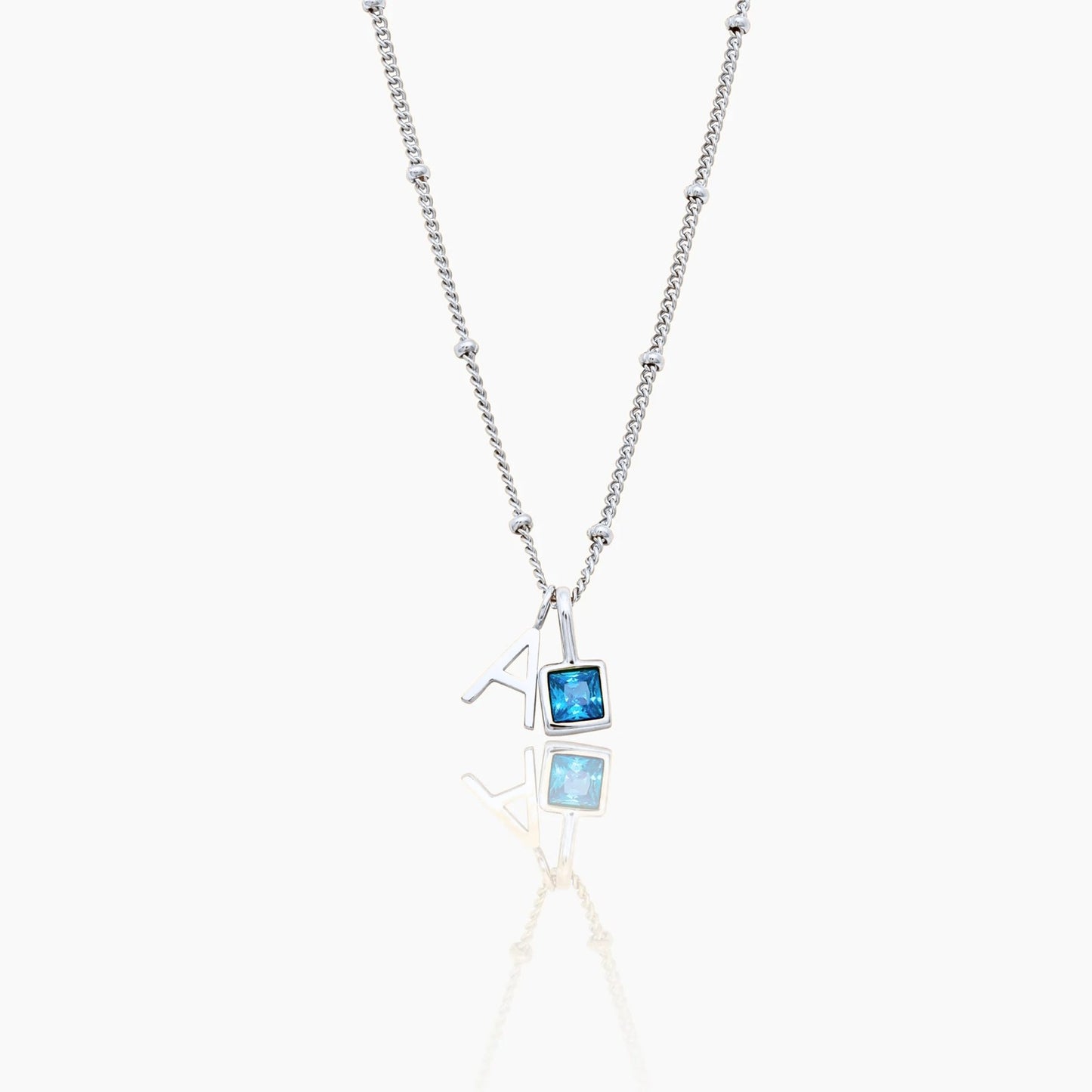 gem-initial-necklace — Silver / Dec-Blue Topaz